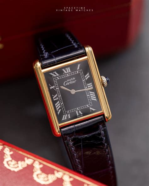 cartier tank black dial